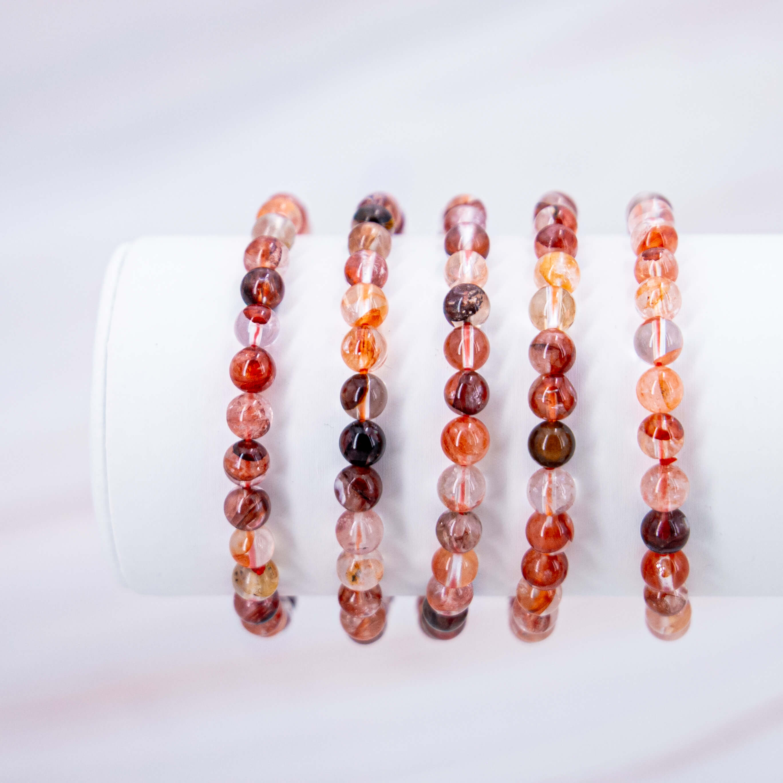 Armband Perlen Perlenarmband Stretch Stretcharmband Kugelarmband Kugel Kristalle Edelsteine Heilsteine Schutzsteine Annurah deutscher Onlineshop 4 6 8 mm Perlen Feuerquarz Quarz rot rosa orange durchsichtig Einschlüsse