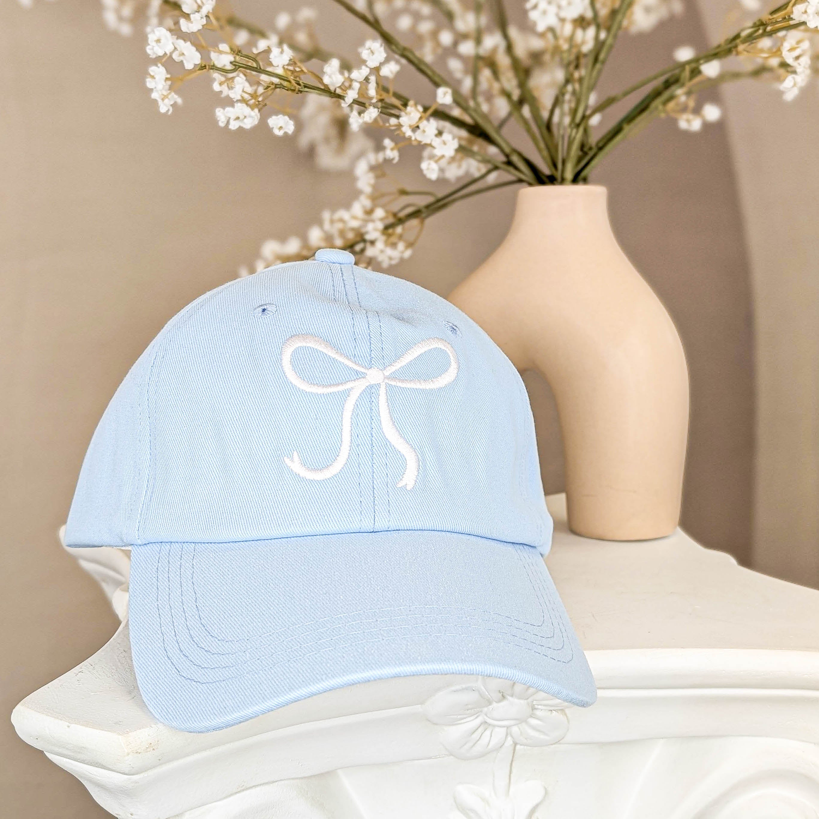 Cap mit Schleifenstickerei - Babyblau