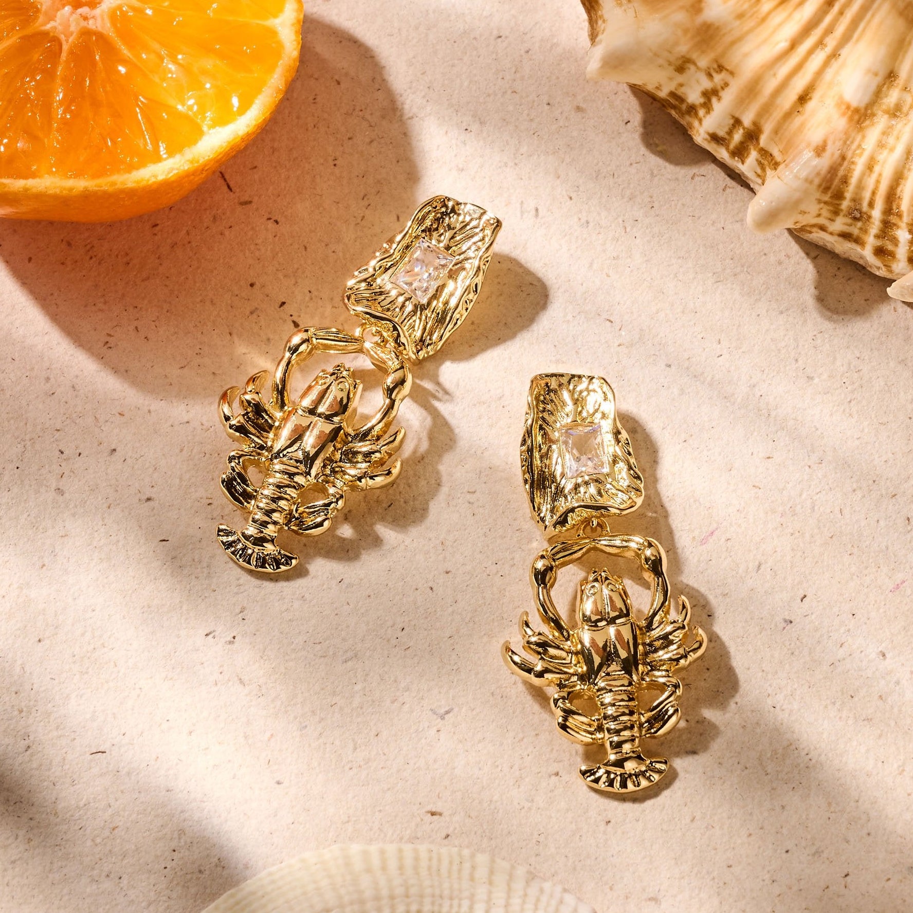 Goldene Hummer Ohrringe mit Kristall