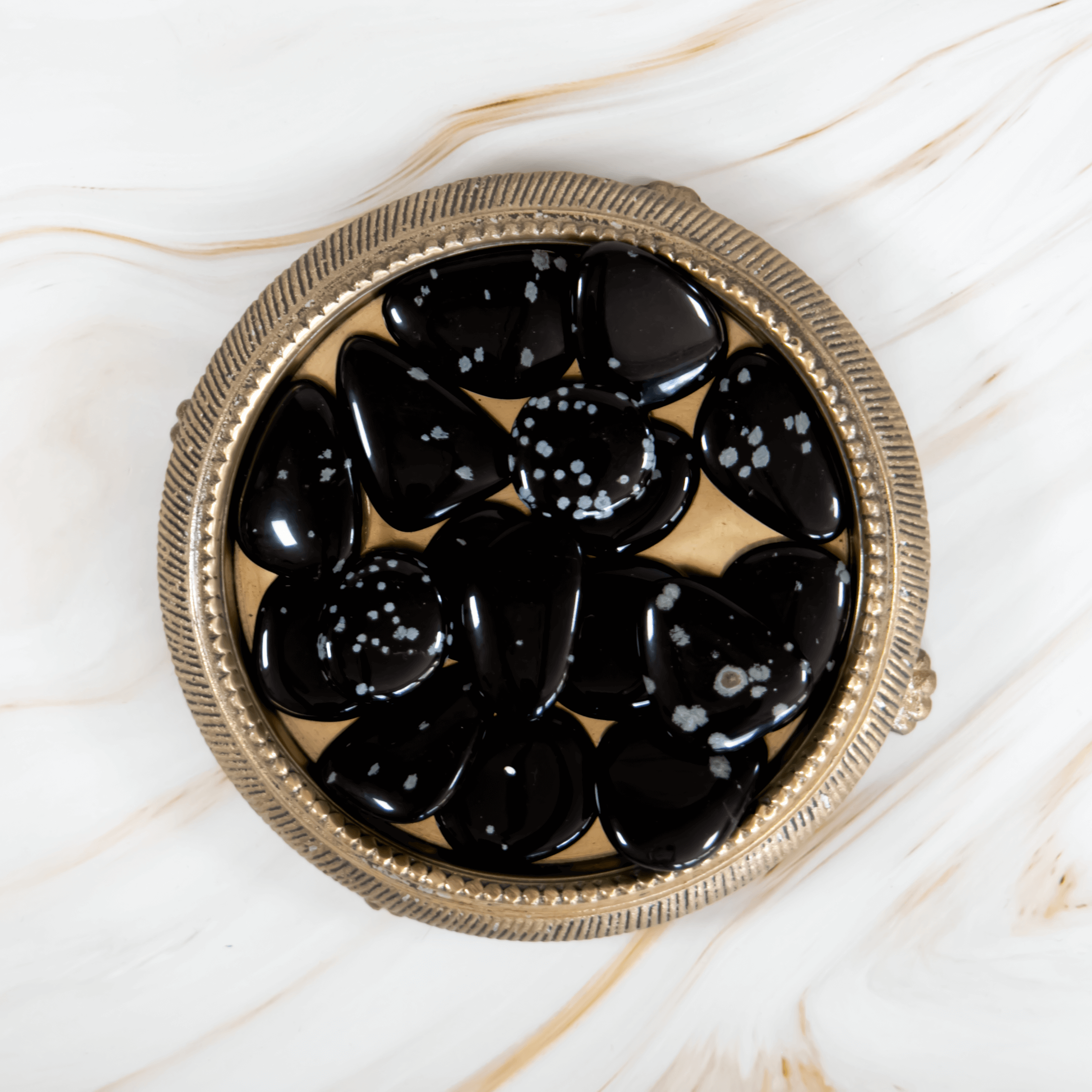 Schneeflocken Scheibenstein heilstein Wirkung edelstein eigenschaften