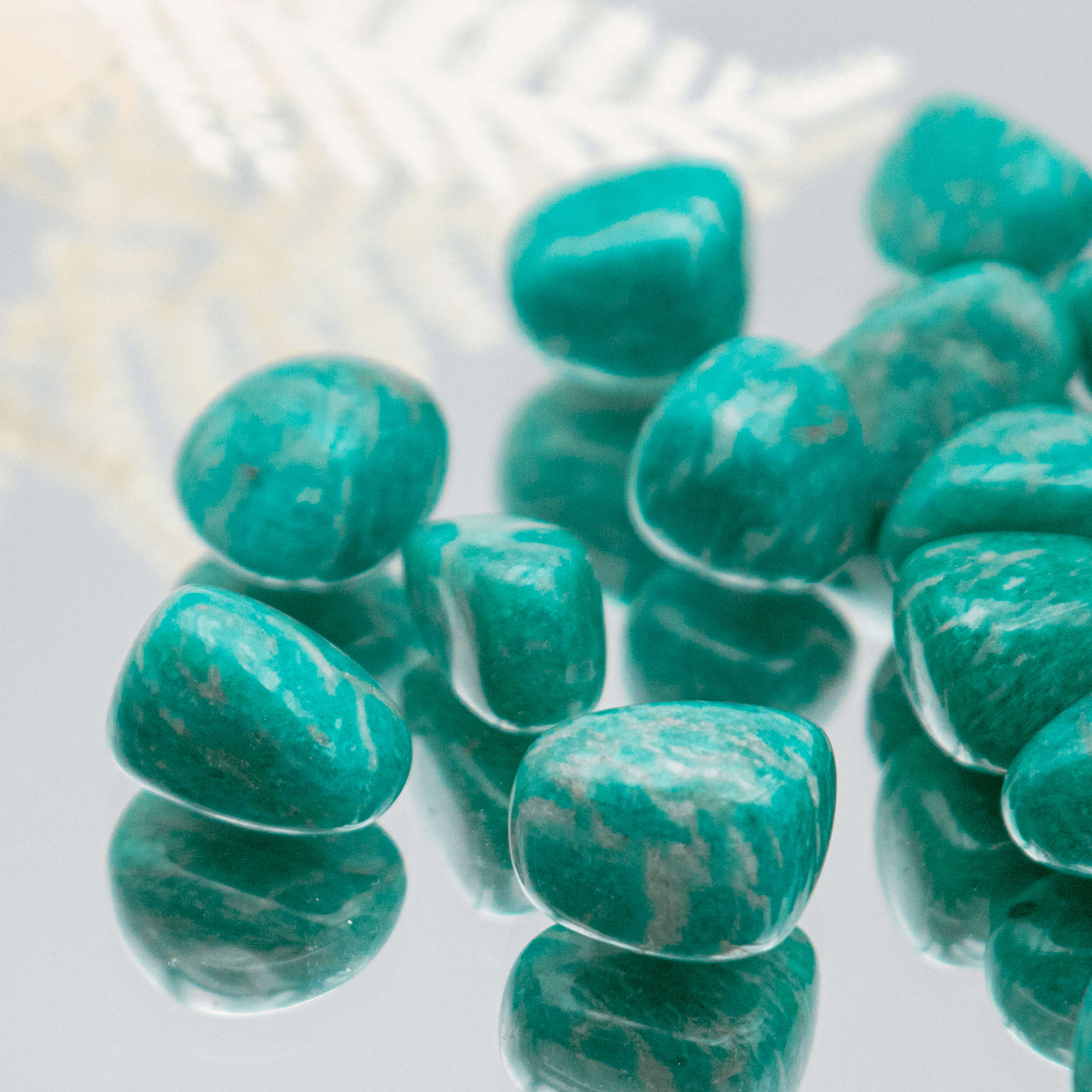 Amazonit Trommelstein Heilstein Kristall blau türkis Herzchakra Chakra Energie Schutz