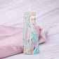 Geburts- & Glücksstein für den: 10. Januar Sternzeichen: Steinbock Chakra: Sakralchakra Karibischer Calcit Calcit Obelisk Turm Spitze Meer Strand Sonne blau braun aqua Türkis Annurah deutscher Onlineshop