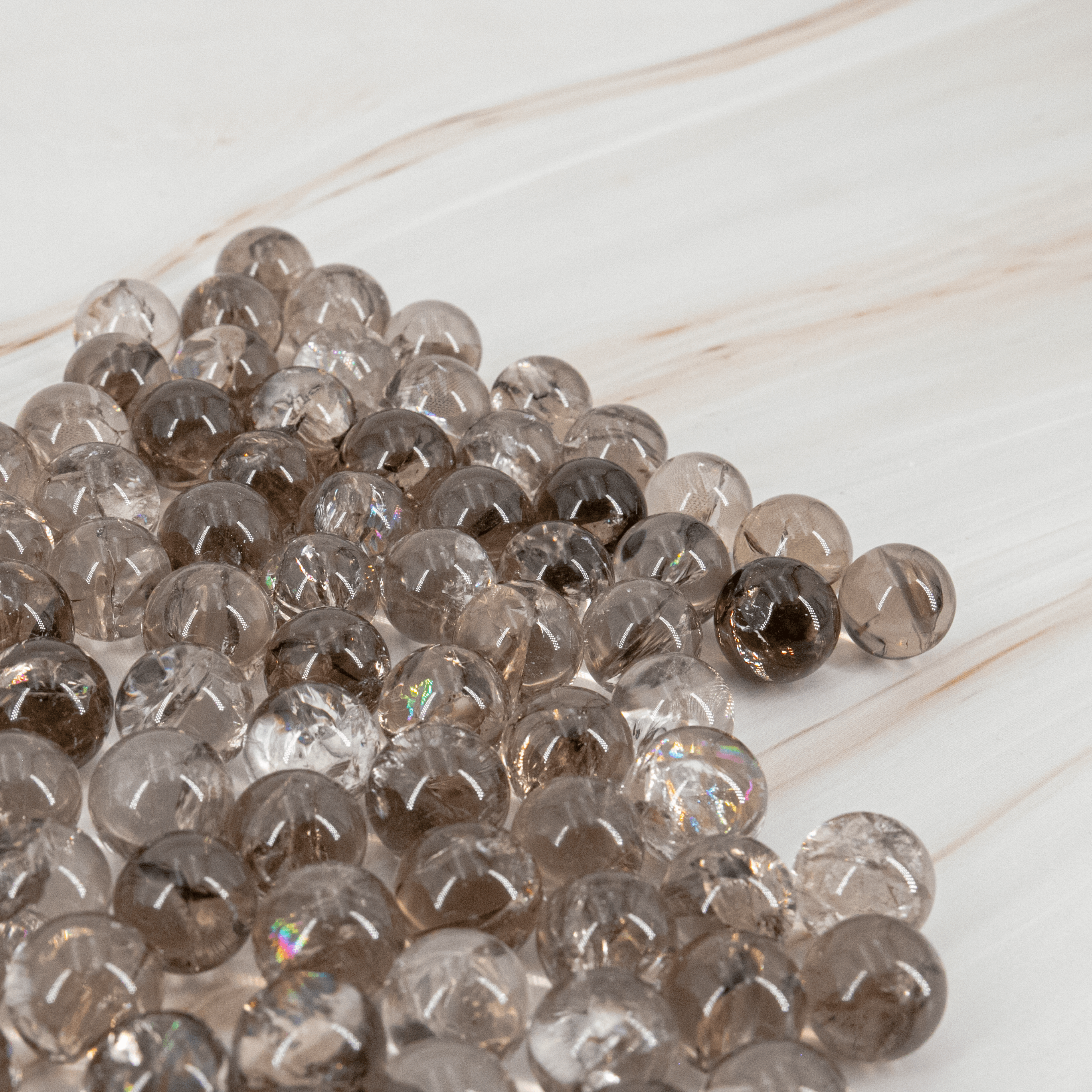 Rauchquarz smoky quartz Kugel Mini sphere Regenbogen flash high quality Schutzstein Kristallkugel Kristalle Edelsteine Heilsteine Annurah deutscher Onlineshop Kopfschmerzen Muskelkrämpfe Verdauungsprobleme Potenz